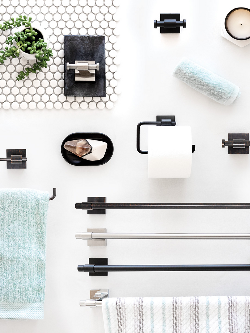A collage with black fixtures including towel racks, a toilet paper holder, and a soap dish.