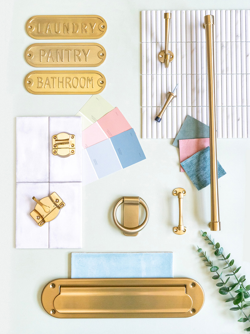 Collection of gold hardware and color swatches on a white background